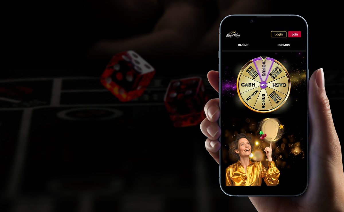 image of a mobile phone with the Regal Wins Casino app
